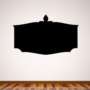 Black vinyl wall decal shaped like a pointed shield banner