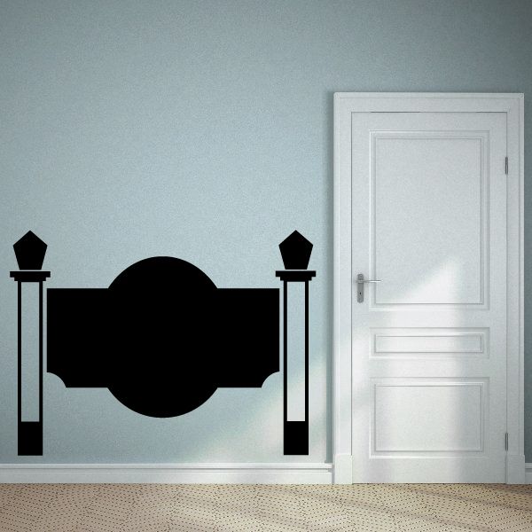 Vinyl wall decal featuring black fence posts and center circle emblem