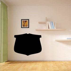 Black shield shaped wall decal, vinyl business sign