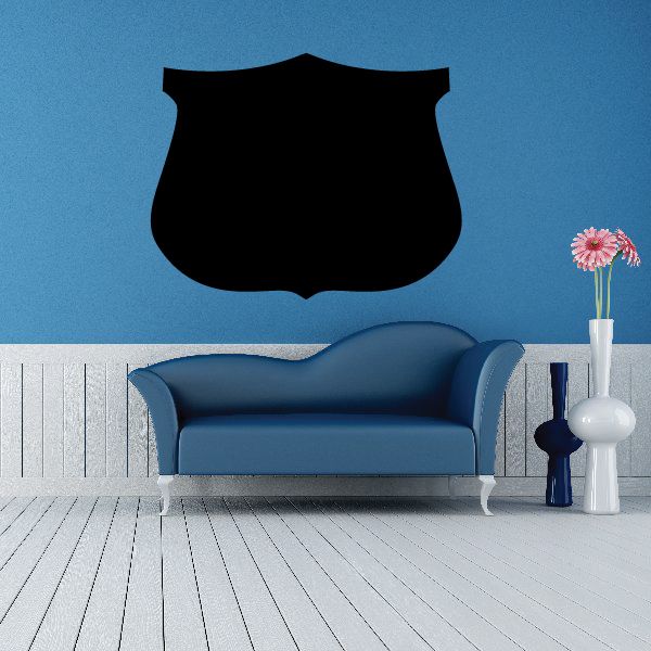 Black shield-shaped vinyl wall decal