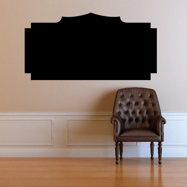 Black vinyl wall decal in rectangular badge shape with notched top edge