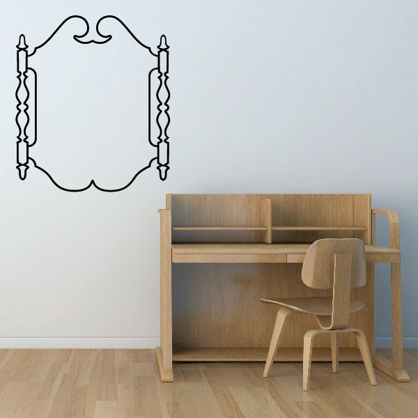 Black vinyl wall decal with ornate oval frame and two candle shapes