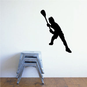 Black lacrosse player decal silhouette with raised stick
