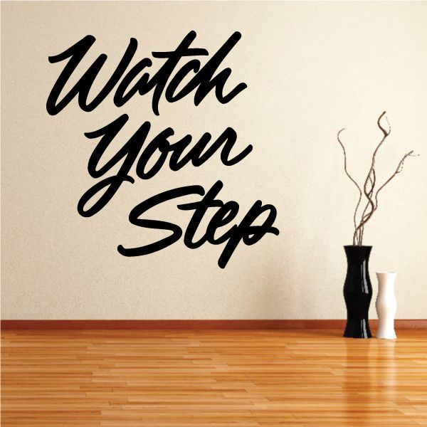 Watch Your Step wall decal in black script lettering