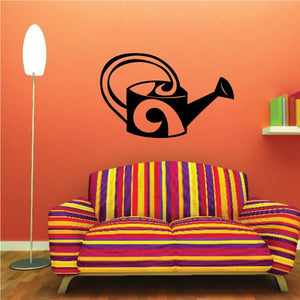 Watering can wall decal with orange swirl and black outlines