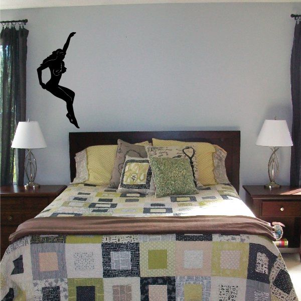 Dark woman silhouette with long waving hair wall decal