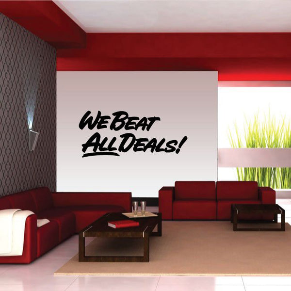 Wall decal with black “We Beat All Deals!” text on white panel