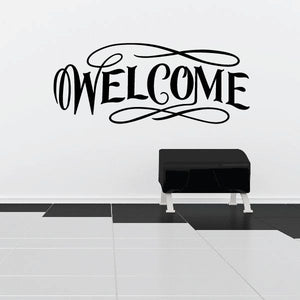 Welcome vinyl wall decal with stylized WELCOME lettering, black