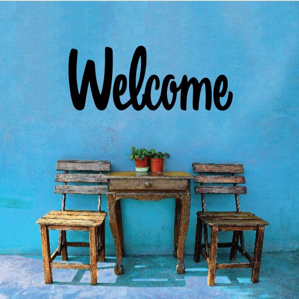 Welcome wall decal with three rustic chairs, table, and potted plants