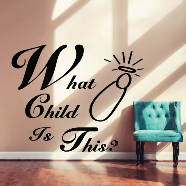 Black cursive wall decal reading 'What Child Is This?' with sun icon