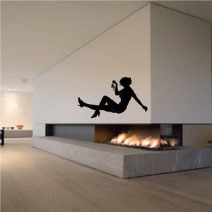 Woman holding panties silhouette wall decal, black figure reclining
