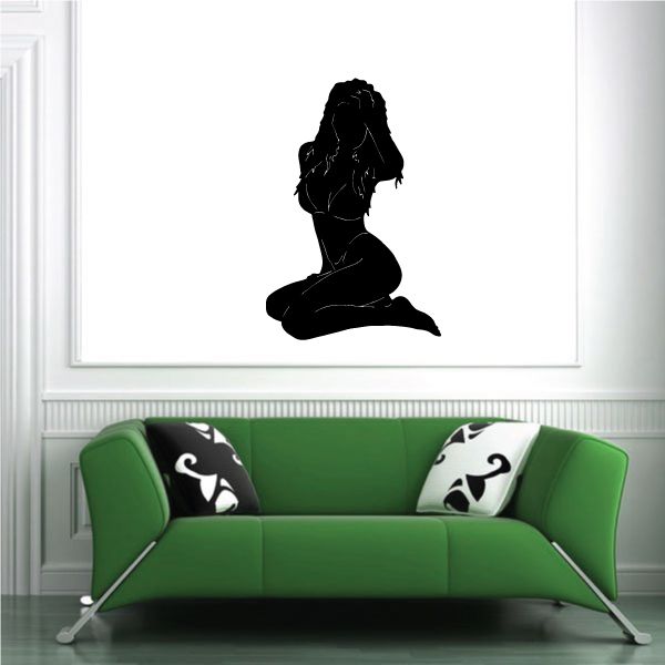 Black bikini silhouette wall decal of a seated woman