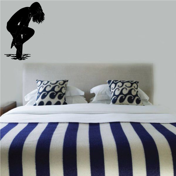 Image of Woman Removing Bikini Standing in Water Silhouette Decal