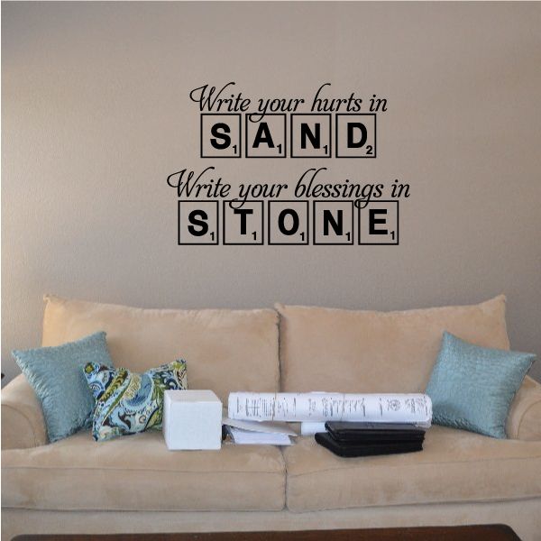 Inspirational wall decal with script text and word blocks reading "SAND" and "STONE"