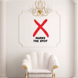 Toilet decal with red X and 'MARKS THE SPOT' text
