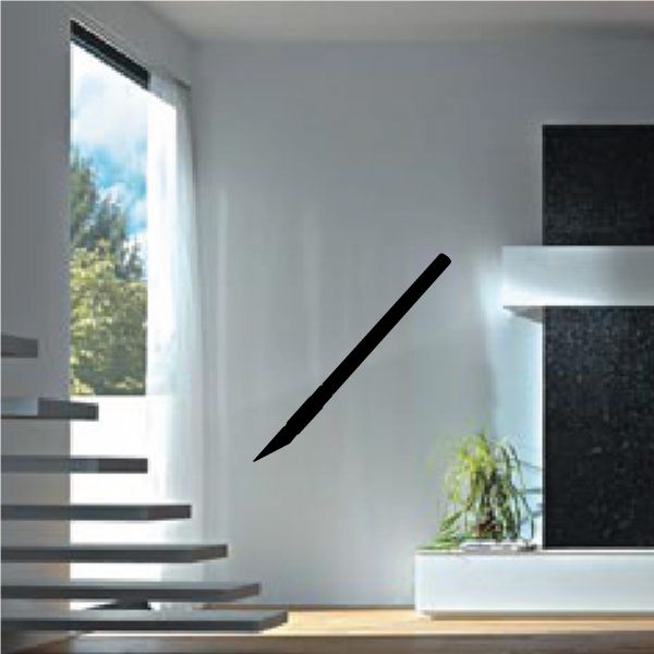 Xacto decal: black diagonal arrow-like mark on a wall