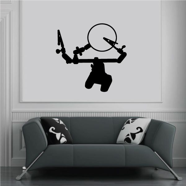 Mounted holder wall decal featuring black magnifying glass and grip