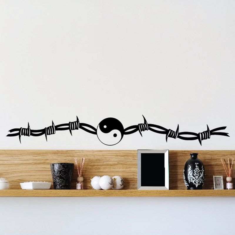 Yin-yang barbed wire wall decal with black and white yin yang symbol