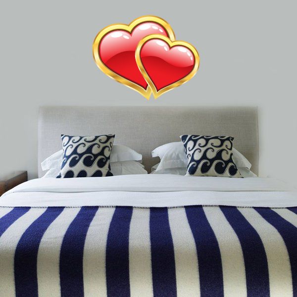 Two gold-outlined red heart Valentine’s Day stickers