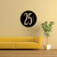 Black circular 25 years decal with gold “25 YRS” and vertical “FAR”