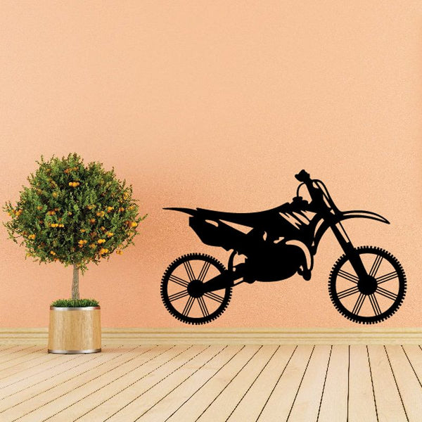 Dirt bike decal featuring a black side-view motorcycle silhouette on a light background