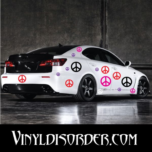 Peace sign wall decal set with 37 peace symbols in pink, purple, and white