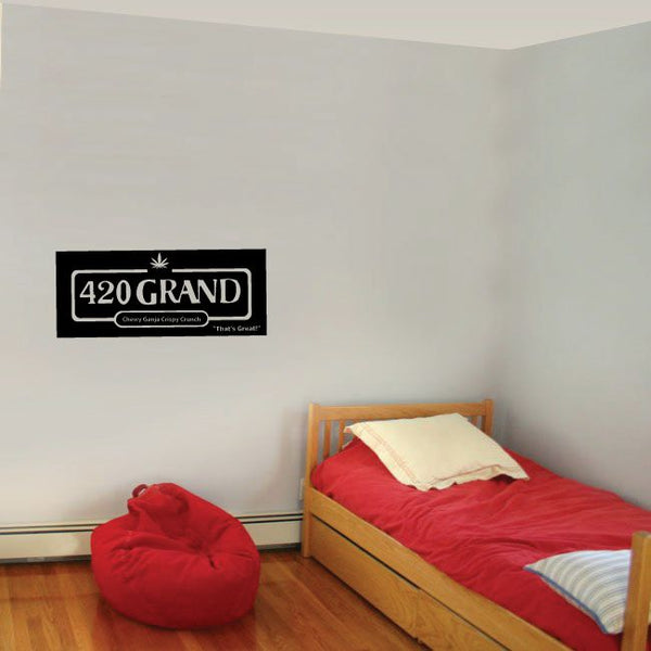 Candybar wall decal: black rectangle with "420 GRAND" and small line text.