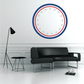 Circular holiday decal with blue outer ring, red trim, and a border of stars
