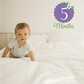 5 months wall decal with number 5 in purple circle and green floral accents