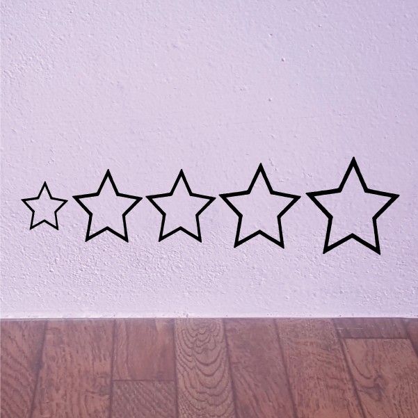Five black outlined star wall decals