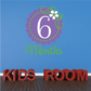 Purple 6-month wall decal with flower and green text, plus KIDS ROOM letters