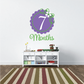 Purple 7 Months wall decal with green vine and white flower