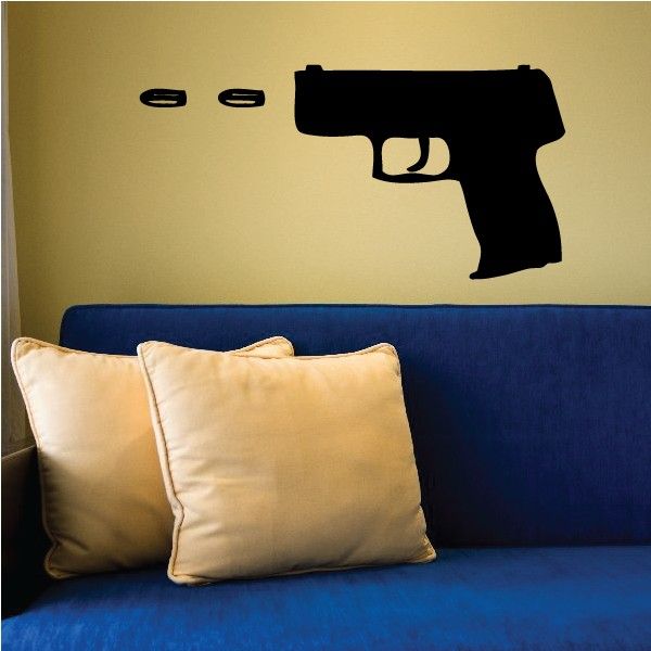 Black pistol firing decal with slide and trigger, plus small ammo pieces