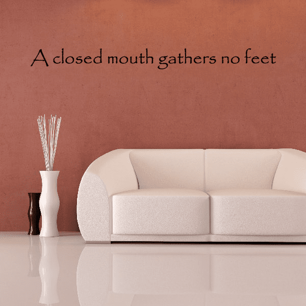 Wall decal with text: A closed mouth gathers no feet
