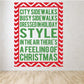 Christmas quote decal with red zigzag border and stacked text, A FEELING OF CHRISTMAS