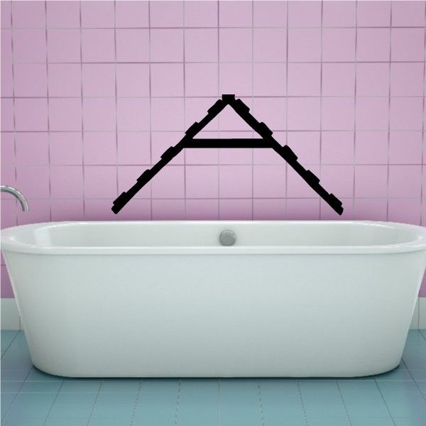Black A-frame ramp obstacle wall decal above a white bathtub