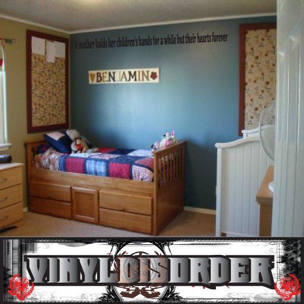 Vinyl wall decal with large dark typography and decorative red corner ornaments