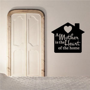 House-shaped wall decal with heart and quote: “A Mother is the Heart of the home”