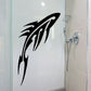 Abstract whale tail blade decal, bold black graphic with sharp fins.