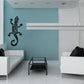 Black abstract lizard wall decal with ornate scrolling details