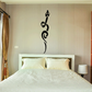 Black abstract king cobra snake wall decal with curled flames and whisker-like lines.