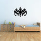 Tribal dragon wall decal with black stylized wings and ornamental center