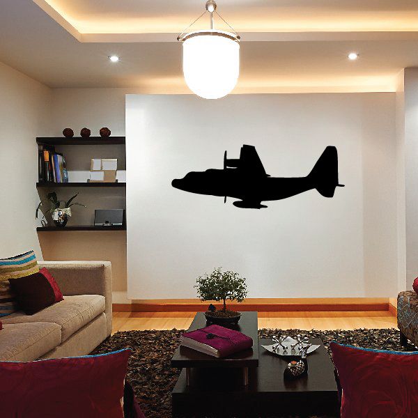 Black jet aircraft silhouette wall decal with swept wings and tail
