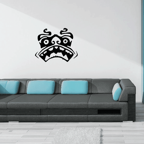 Black tiki face wall decal with tribal markings and fierce grin