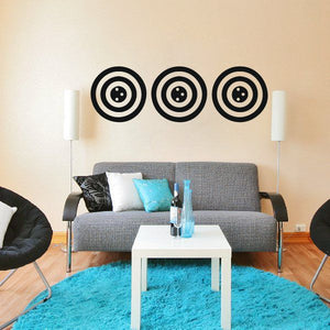 Round wall decal set with concentric circle pattern in black and cream