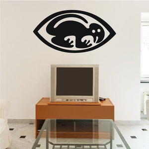 Lizard eye wall decal in black and white with white dots and curved eyelid lines