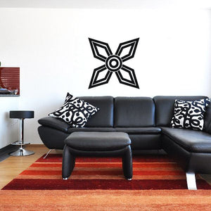 Pointed star wall decal with circular center, black and white geometric style