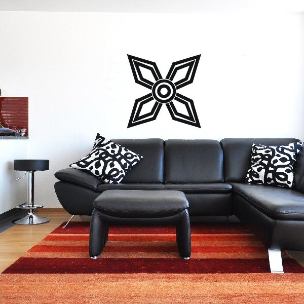 Pointed star wall decal with circular center, black and white geometric style
