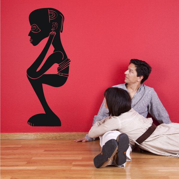 African male sitting statue wall decal, black profile silhouette with braided hair.
