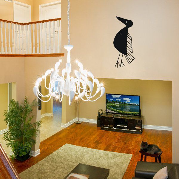 Black standing bird wall decal with open beak and striped wing detail